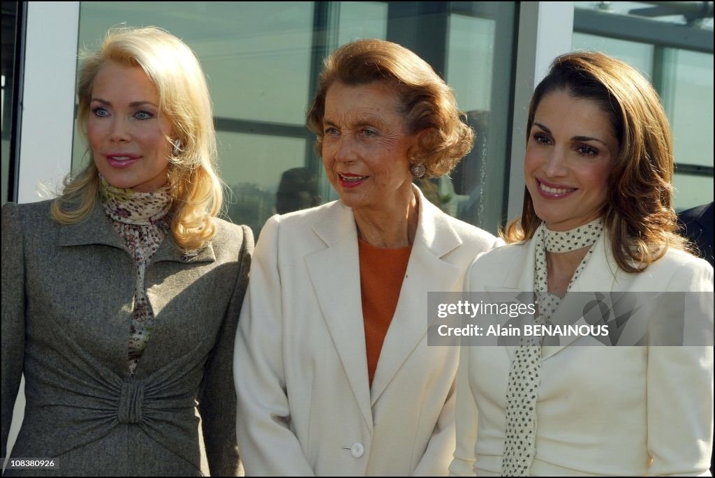 Queen Rania Of Jordan And Begum Aga Khan Attend Cartier Foundation Jewellery Auction For The Voice Of Children Charity in Paris, France on September 30, 2002.