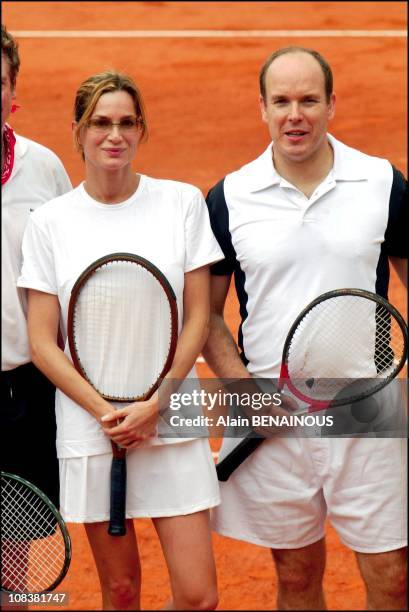 Prince Albert Of Monaco And His Friend Alexandra Kamp Participate In Tennis Tournament Of The Forty-Second Film Festival Of Monaco in Monaco on July...