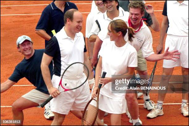 Prince Albert Of Monaco And His Friend Alexandra Kamp Participate In Tennis Tournament Of The Forty-Second Film Festival Of Monaco in Monaco on July...