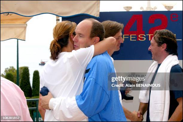 Prince Albert Of Monaco And His Friend Alexandra Kamp Participate In Tennis Tournament Of The Forty-Second Film Festival Of Monaco in Monaco on July...