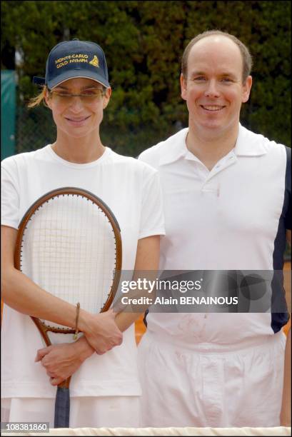 Prince Albert Of Monaco And His Friend Alexandra Kamp Participate In Tennis Tournament Of The Forty-Second Film Festival Of Monaco in Monaco on July...