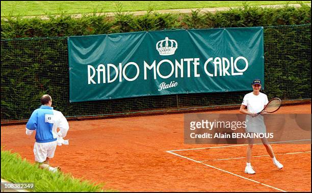 Prince Albert de Monaco and his friend Alexandra Kamp participate in tennis tournament of the forty-second film festival of Monaco in Monaco on July...