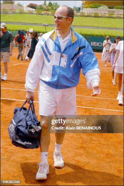 Prince Albert Of Monaco And His Friend Alexandra Kamp Participate In Tennis Tournament Of The Forty-Second Film Festival Of Monaco in Monaco on July...