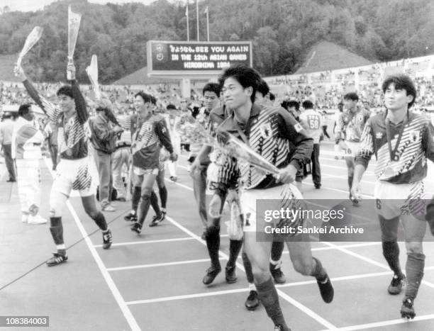 Japanese players including Satoshi Tsunami , Kazuyoshi Miura and Tsuyoshi Ihara celebrate winning the 1992 AFC Asian Cup final match between Japan...