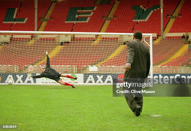 Pele scores past Gordon Banks during an AXA photocall at Wembley in London. \ Mandatory Credit: Clive Mason /Allsport