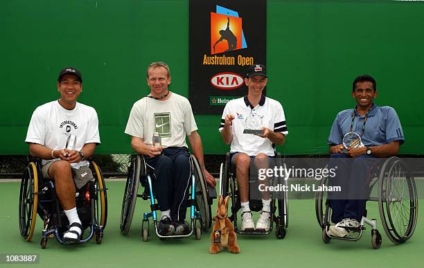 The Mens Wheelchair Doubles finalists pose. Winners Robin Ammerlaan of The Netherlands and Jayant Mistry of Great Britain and Satoshi Saida of Japan...