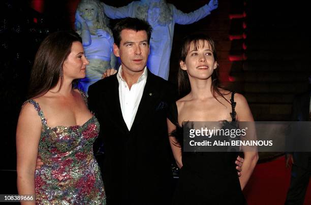 Pierce Brosnan & wife & Sophie Marceau in Paris, France on November 25, 1999.