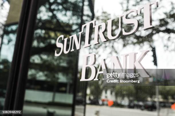 Signage is displayed outside of a SunTrust Banks Inc. Branch in St. Petersburg, Florida, U.S., on Monday, Jan. 14, 2019. SunTrust Banks Inc. Is...