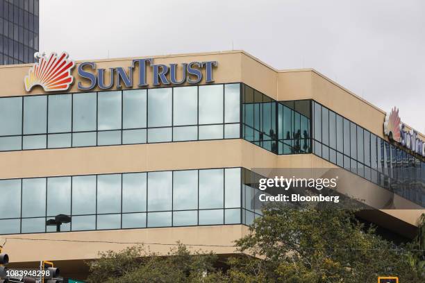 Signage is displayed outside of a SunTrust Banks Inc. Branch in St. Petersburg, Florida, U.S., on Monday, Jan. 14, 2019. SunTrust Banks Inc. Is...