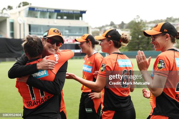Scorchers head coach Lisa Keightley embraces Heather Graham of the Scorchers after victory in the Women's Big Bash League match between the Hobart...