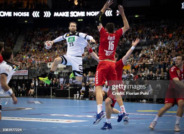 Steffen Faeth of DHB and Drasko Nenadic of Team Serbien during the game between Germany and Serbien at the Mercedes-Benz-Arena on january 17, 2019 in...