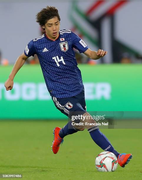 Ito Junya of Japan in action during the AFC Asian Cup Group F match between Japan and Uzbekistsn at Khalifa Bin Zayed Stadium on January 17, 2019 in...