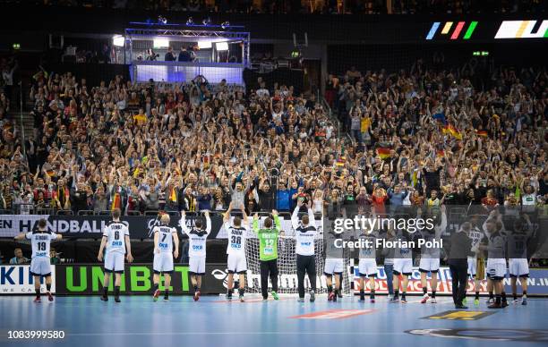 The players of the DHB celebrates the 31:23 win with the fans after the game between Germany and Serbien at the Mercedes-Benz-Arena on january 17,...