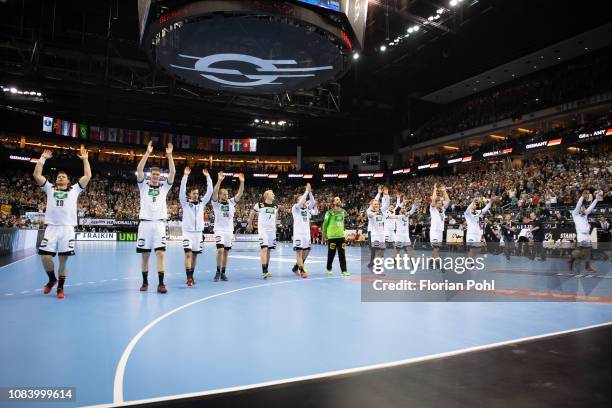 The players of the DHB celebrates the 31:23 win with the fans after the game between Germany and Serbien at the Mercedes-Benz-Arena on january 17,...
