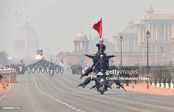 Indian Army's Corp of Signals' Dare Devil team displays their skills during the rehearsals ahead of the Republic Day Parade, at Rajpath on January...