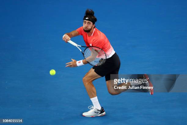 Nikoloz Basilashvili of Georgia plays a forehand in his third round match against Stefanos Tsitsipas of Greece during day five of the 2019 Australian...