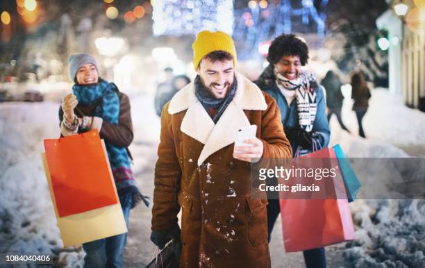 i have a surprise for you. - winter woman showing stock pictures, royalty-free photos & images