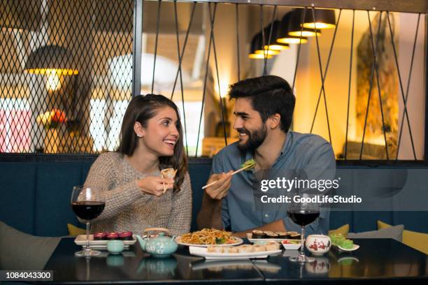 couple dining - couple dinner stock pictures, royalty-free photos & images