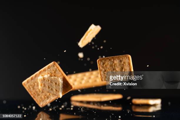 cookies jump in sky in high speed - high sticking stock pictures, royalty-free photos & images