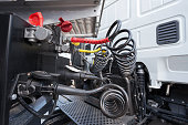Engine and compressed air hoses of a truck