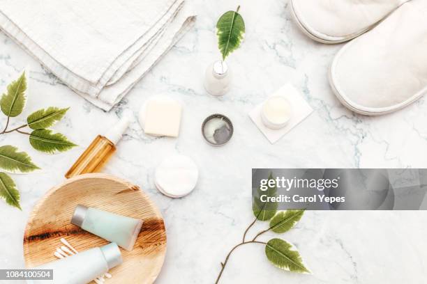 organic spa cosmetic on marble background - hair products ストックフォトと画像