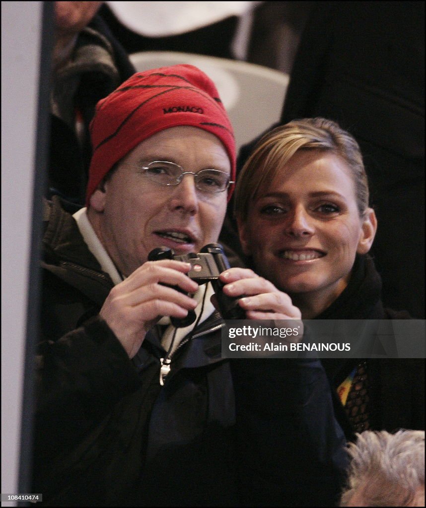 Prince Albert of Monaco with his new girlfriend Charlene Wittstock at the Opening ceremony of the 2006 Winter Olympics in Turin, Italy on February 10, 2006.