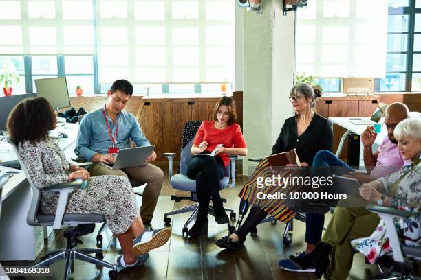 diverse group of business colleagues in office meeting - workplace respect stock pictures, royalty-free photos & images