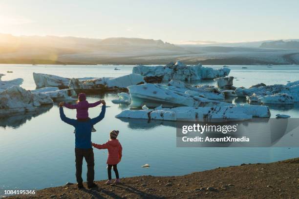 family traveling in iceland - family ice nature stock pictures, royalty-free photos & images