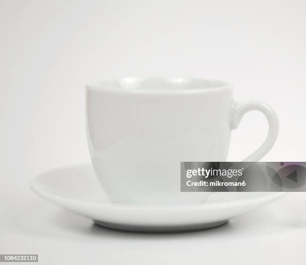 white cup with saucer isolated on white background - pires imagens e fotografias de stock