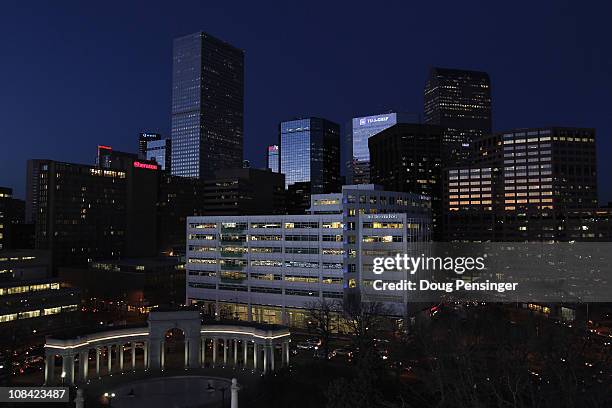 The Denver downtown skyline basks in the glow of the twilight during the LG FIS World Cup Snowboard Big Air Event in Civic Center Park on January 26,...