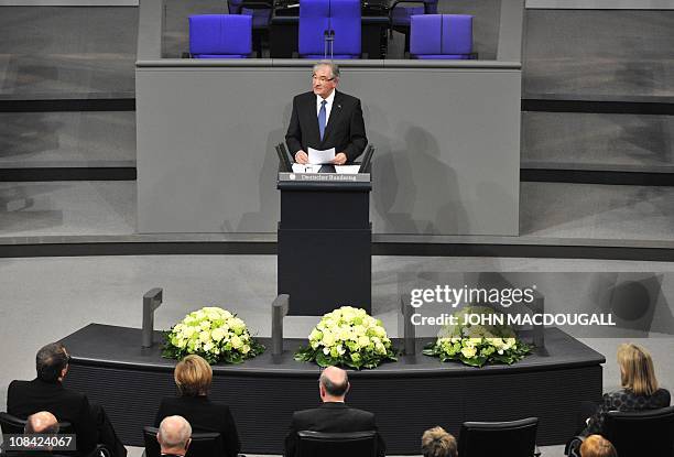 Dutch-born Roma Holocaust survivor Zoni Weisz addresses Germany's lower house of parliament during an official Holocaust ceremony in Berlin on...