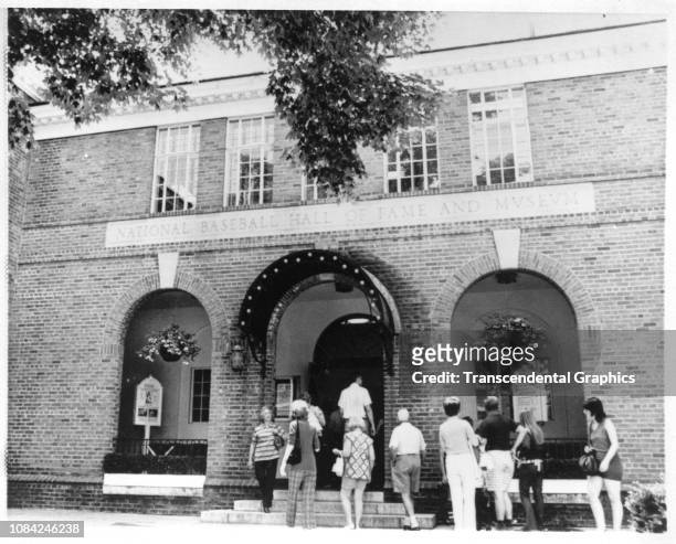 Museum goers anter the National Baseball Hall of Fame and Museum, Cooperstown, New York, summer 1939.