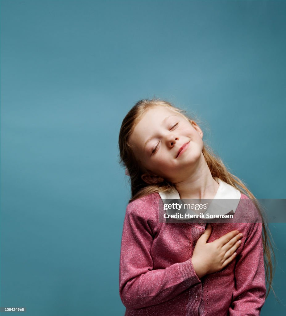 Portrait of young girl pledging alliance
