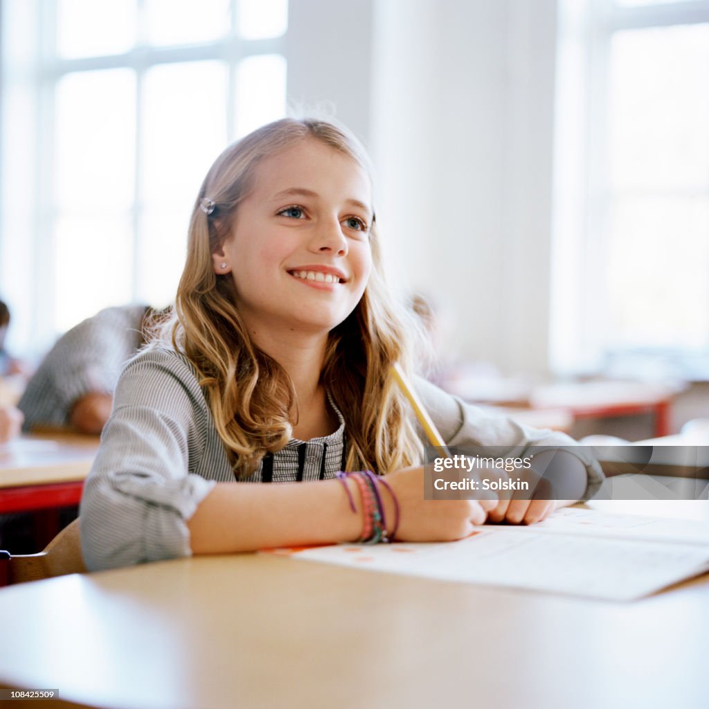 Girl in school class