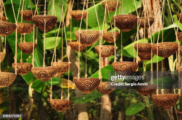 carved coconuts hanging decoration - thai fruit carving stock pictures, royalty-free photos & images