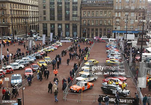 Competitors and cars gather in George Square prior to the start of the Monte Carlo Rally on January 27, 2011 in Glasgow, Scotland. Forty nine classic...