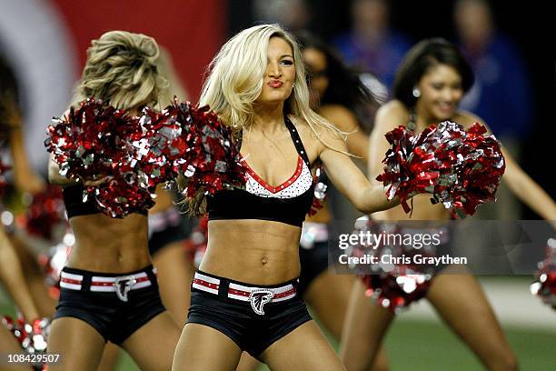 Cheerleaders from the Atlanta Falcons perform against the Green Bay Packers during their 2011 NFC divisional playoff game at Georgia Dome on January...