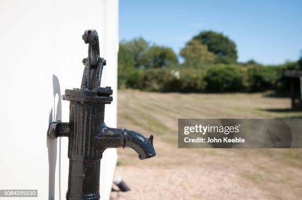 exterior property views - water pump stock pictures, royalty-free photos & images