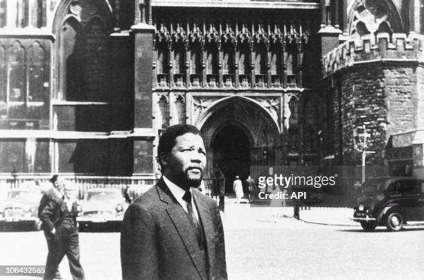 Nelson Mandela in London in 1961. The ANC responds to government's banning by endorsing an "armed struggle." Mandela goes underground and launches...
