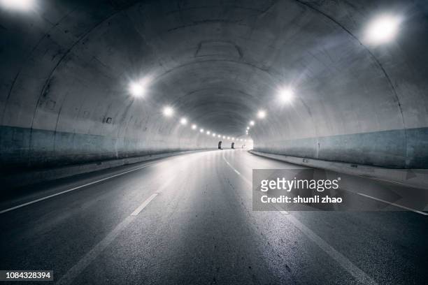 road and tunnel - 車道トンネル ストックフォトと画像
