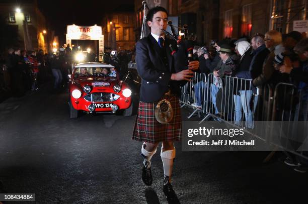 Piper leads competitors in their car across the start line of the Monte Carlo Rally on January 27, 2011 in Glasgow, Scotland. Forty nine classic cars...