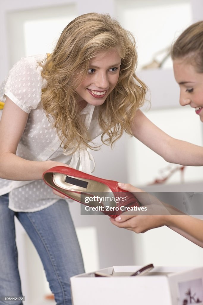 Girls in a shoe shop