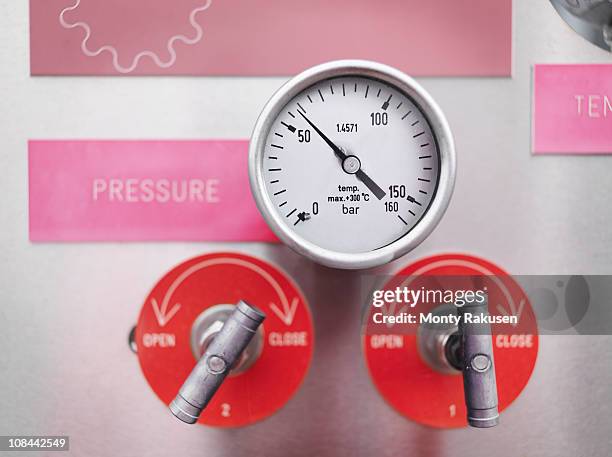 gauges and valves at gas storage plant - pressure gauge stock pictures, royalty-free photos & images