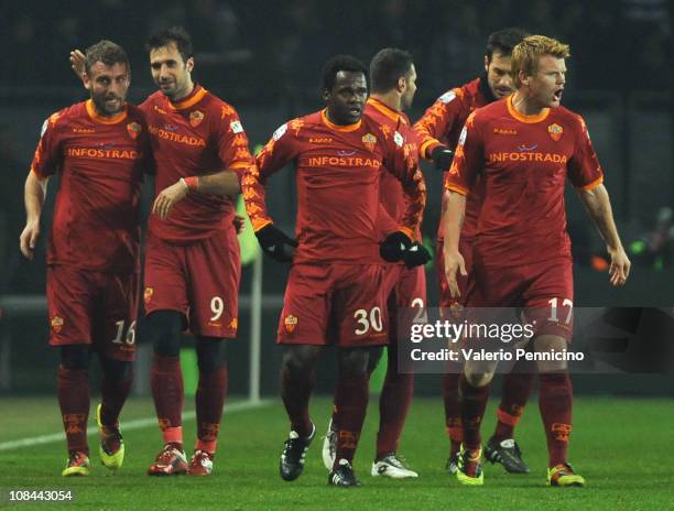 Mirko Vucinic of AS Roma celebrates with Daniele De Rossi and team mates after scoring the opening goal during the TIM Cup match between Juventus FC...