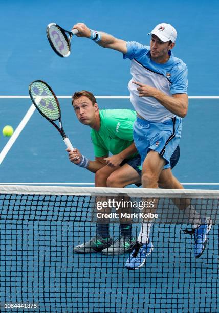 Henri Kontinen of Finland and John Peers of Australia during their second round match against Neal Skupski of Great Britain and Ken Skupski of Great...