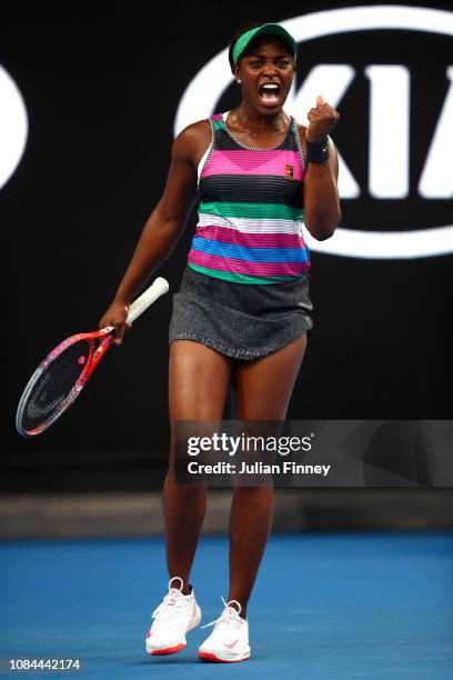 Sloane Stephens of the United States celebrates winning the the first set in her third round match against Petra Martic of Croatia during day five of...