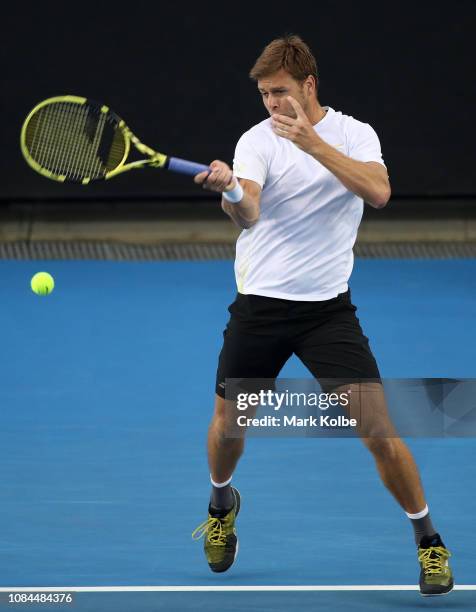 Ryan Harrison of the United States plays a shot in his second round doubles match with Sam Querrey against Artem Sitak of New Zealand and Austin...