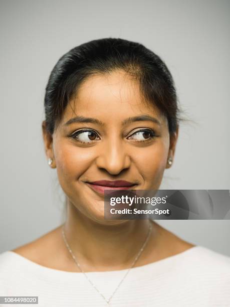 real indian young woman with happy expression - looking around stock pictures, royalty-free photos & images