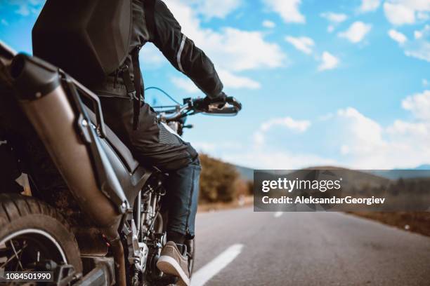 alone on the road - motorcycle biker stock pictures, royalty-free photos & images