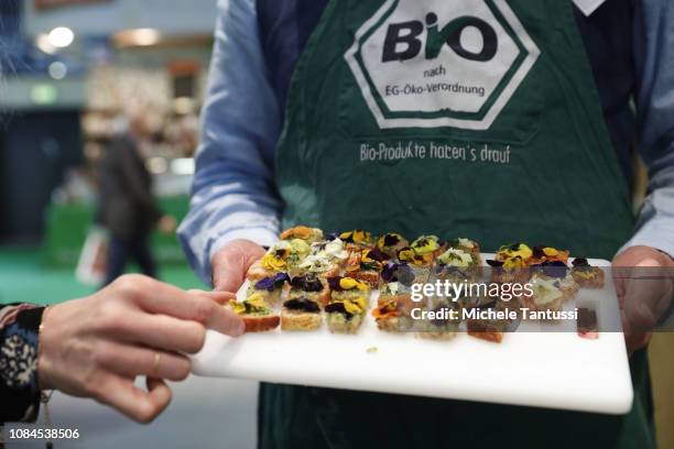 Vendor promotes organic or bio products at the International Green Week agricultural trade fair on January 18, 2019 in Berlin, Germany. The future of...